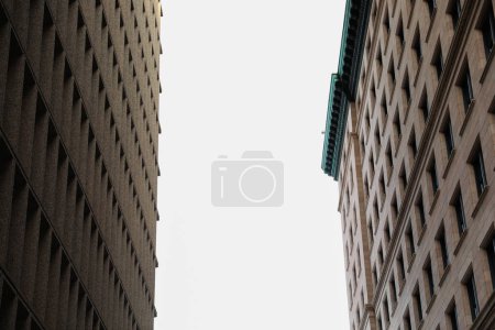 Photo for City brick buildings can symbolize urbanization, industrialization, and modernity, representing stability and endurance, while the cityscape suggests a bustling and dynamic environment - Royalty Free Image
