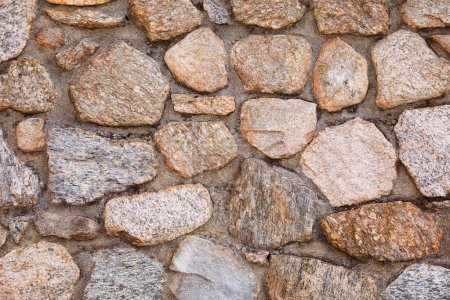 Téléchargez les photos : Plan rapproché de roches avec différentes textures, couleurs et motifs. Les roches symbolisent la force, la stabilité et l'endurance, tandis que leurs textures représentent la complexité et la diversité de la nature - en image libre de droit