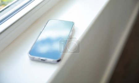 Photo for An empty black phone screen mock-up symbolizes the potential for disconnection and addiction to technology, highlighting the need for balance and mindfulness in our relationship with digital devices - Royalty Free Image