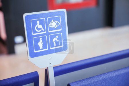 Photo for Blue handicap sign is a universal symbol of accessibility and inclusivity for people with disabilities. It represents a commitment to removing barriers and creating equal opportunities for all - Royalty Free Image