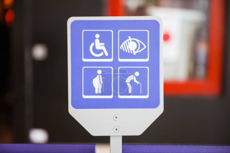 Photo for Blue handicap sign is a universal symbol of accessibility and inclusivity for people with disabilities. It represents a commitment to removing barriers and creating equal opportunities for all - Royalty Free Image