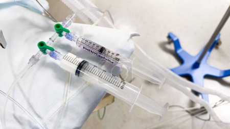 Photo for Propofol anesthesia syringes symbolize medical sedation, drug administration, and patient comfort. They represent the use of medications like propofol, fentanyl, and midazolam for anesthesia and pain - Royalty Free Image