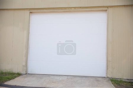 Photo for American home garage: a symbol of personal space, storage, security, and the embodiment of American car culture and DIY spirit - Royalty Free Image