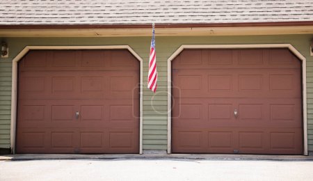 Photo for American home garage: a symbol of personal space, storage, security, and the embodiment of American car culture and DIY spirit - Royalty Free Image