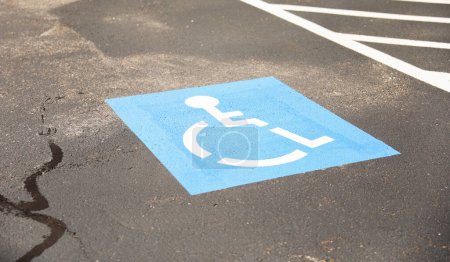 Handicap sign represents accessibility, inclusivity, equal rights, and consideration for individuals with disabilities-stock-photo