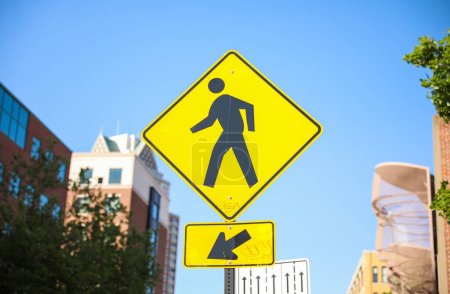 Photo for Pedestrian sign: a symbol of pedestrian safety, crosswalks, caution, and the importance of sharing the road - Royalty Free Image