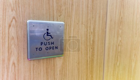 Photo for Handicap sign represents inclusivity, equal rights, and support for individuals with disabilities. Its blue and white sign denotes accessibility and serves as a reminder to create an inclusive society - Royalty Free Image