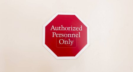 Photo for Authorized Personnel Only' restricts access, conveying exclusivity, safety, and confidentiality in a limited area - Royalty Free Image