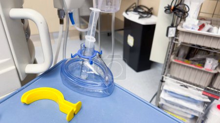 Photo for Hospital airway kit signifies emergency airway management. Endotracheal tube, supraglottic airway, laryngoscope, and Ambu bag symbolize crucial interventions for respiratory support - Royalty Free Image