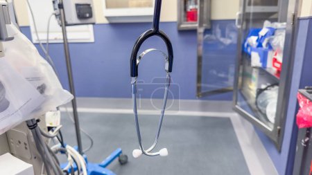 Photo for Stethoscope lying on a medical report, representing the vital connection between healthcare professionals and patient well-being - Royalty Free Image