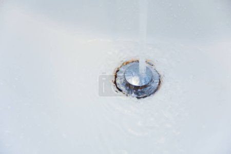 Photo for Water tap with drop of water - Royalty Free Image