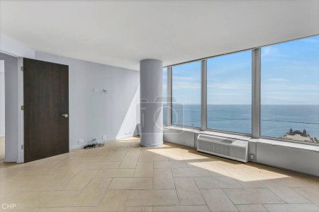 Téléchargez les photos : Chambre vide intérieur avec vue sur la mer dans la fenêtre. Rendu 3d - en image libre de droit