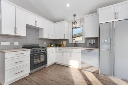 Photo for Cabinets and appliances in modern kitchen. 3d rendeirng - Royalty Free Image
