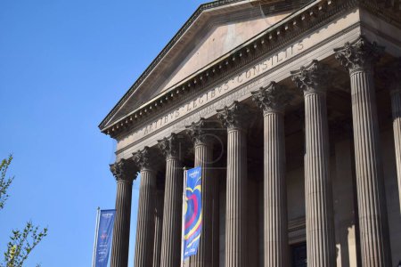 Photo for Liverpool, Merseyside, United Kingdom - April 18 2023: BBC banners waving outside of St George's Hall, Liverpool, for the 67th Eurovision Song Contest 2023 in the UK in support of Ukraine, United by Music - Royalty Free Image