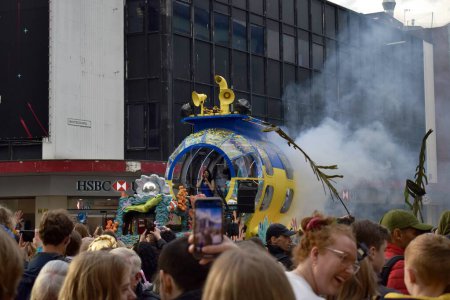 Photo for Liverpool, Merseyside, United Kingdom - May 5 2023: Eurovision Song Contest 2023, the Blue and Yellow Submarine Parade kicks off the party in Liverpool for the launch of EuroVillage fan hub. Submarine parade float. - Royalty Free Image