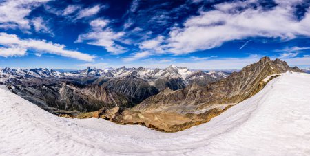 Photo for An alpine landscape of Wallis Alps in Switzerland from the Alphubel summit. - Royalty Free Image