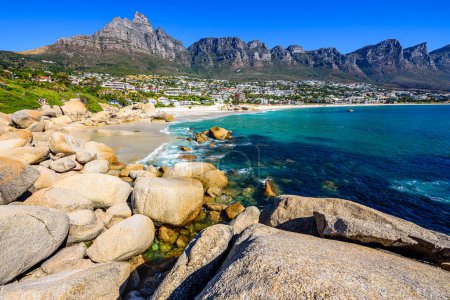 Photo for Camps Bay Beach with Twelve Apostles in the background in Cape Town. - Royalty Free Image