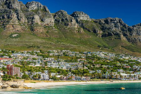 Photo for Camps Bay Beach with Twelve Apostles in the background in Cape Town. - Royalty Free Image