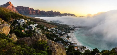 Photo for A huge cloud over the Camps Bay in Cape Town during sunset. - Royalty Free Image