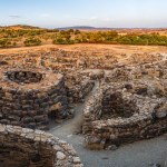The bronze age fort UNESCO world heritage site Su Nuraxi di Barumini on Sardinia island during sunset. 