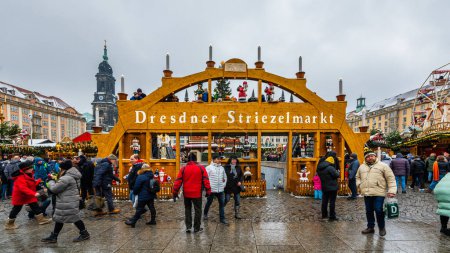 Photo for Dresden, Germany, 17.12.2022 - Dresdner Striezelmarkt christmas market on the Altmarkt square on a cloudy day - Royalty Free Image