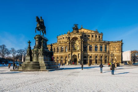 Photo for Dresden, Germany, 18.12.2022 - The Dresden square Theaterplatz in front of the Semperoper full of people on a cold winter day - Royalty Free Image