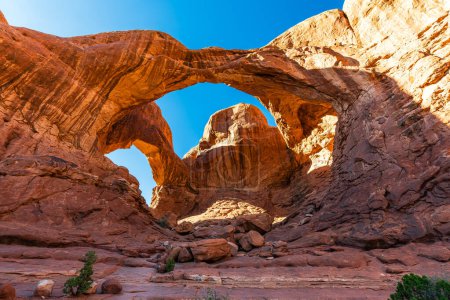The Double Arch rock formation in the Arches National park near Moab, Utah USA.