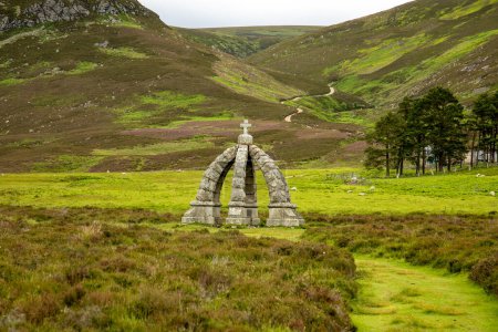 Photo for Beautiful landscape of the valley of the sacred hill - Mount Keen in Scotland and the Queen's well.  From the times of Queen Victoria, a national and historical landmark - Royalty Free Image