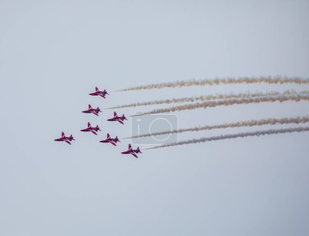 Photo for Aerobatics of aircrafts at an air show - Royalty Free Image