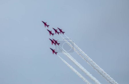 Photo for Aerobatics of aircrafts at an air show - Royalty Free Image