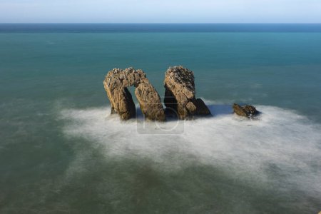 Photo for Urros de Liencres on the broken coast in front of the Cantabrian sea, Cantabria - Royalty Free Image