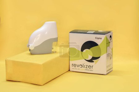 Photo for Revolizer Device is a cost-effective, user-friendly, easy-to-use and a preferred device in patients with mild asthma and COPD, as well as in healthy participants with no previous experience of using inhalation devices. - Royalty Free Image