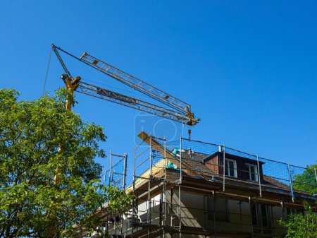 Photo for House Construction Site Crane, Roof, Modernize - Royalty Free Image