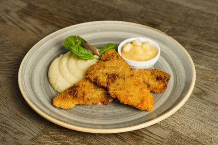 Photo for Fried fish with mashed potatoes and quince apple jam - Royalty Free Image