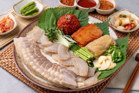 Pork, boiled pork, bossam, skate, pork belly, kimchi, samhap, set menu, noodles, tofu, Korean food, side dishes,-stock-photo
