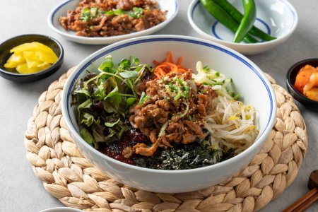 Photo for Korean food, bulgogi, hot noodles, bibimbap, bibim noodles, handmade, pork cutlet, fried dumplings, dumplings, - Royalty Free Image