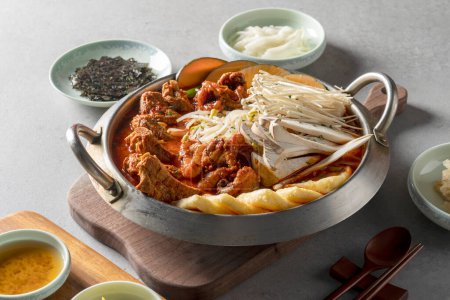 Photo for Korean, webfoot octopus, stir-fried, spicy, back ribs, steamed, bulgogi, white rice, side dishes, lettuce, garlic, kimchi - Royalty Free Image