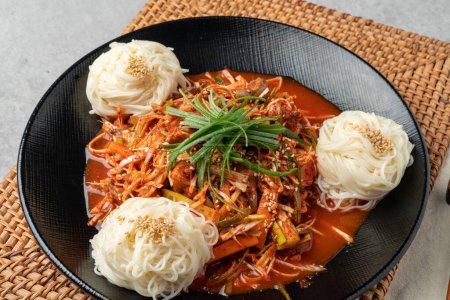 Photo for Korean food, fish, shrimp pancake, sea snail, seasoned noodles, soy sauce, wasabi, mugwort, spicy, chili pepper, perilla leaf, green onion - Royalty Free Image
