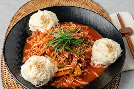 Photo for Korean food, fish, shrimp pancake, sea snail, seasoned noodles, soy sauce, wasabi, mugwort, spicy, chili pepper, perilla leaf, green onion - Royalty Free Image