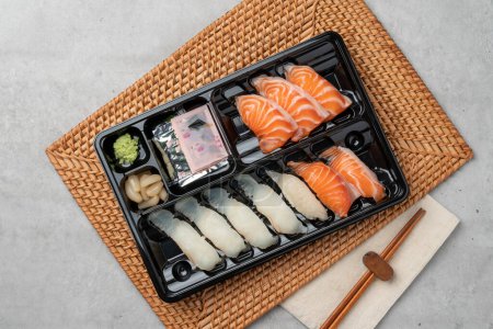 Japanese, sushi, sashimi, fish, eel, shrimp, flatfish, rockfish, salmon, sashimi rice, raw salmon, fried tofu rice, soy sauce, wasabi, egg roll, onion, flying fish egg