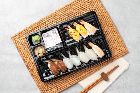 Japanese, sushi, sashimi, fish, eel, shrimp, flatfish, rockfish, salmon, sashimi rice, raw salmon, fried tofu rice, soy sauce, wasabi, egg roll, onion, flying fish egg