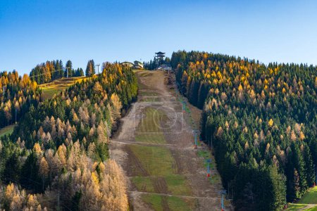 A ski slope at Semmering, Austria, in the late winter. Landscape background and wallpaper.