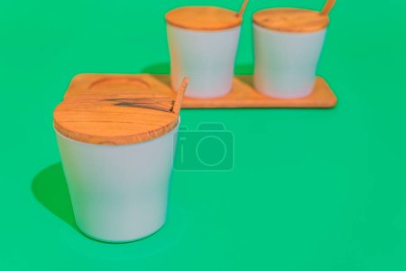 Photo for The Wooden Spice Jar Set offers a natural and stylish way to store your favorite spices. - Royalty Free Image
