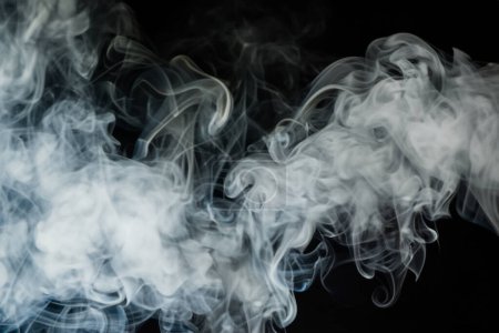smoke of a steam on a black background. abstract background.