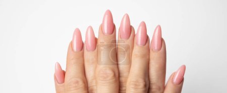 Photo for Stylish trendy nail young woman hands pink manicure on white background - Royalty Free Image