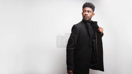 Photo for Handsome multiracial young man looking away while posing. Serious man studio shot. Isolated on white background - Royalty Free Image