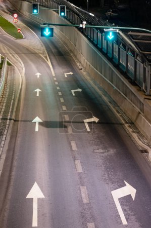 Photo for Highway in the city at night with road markings and traffic lights - Royalty Free Image