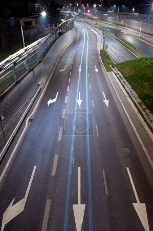 Photo for Highway in the city at night with markings on the road. - Royalty Free Image