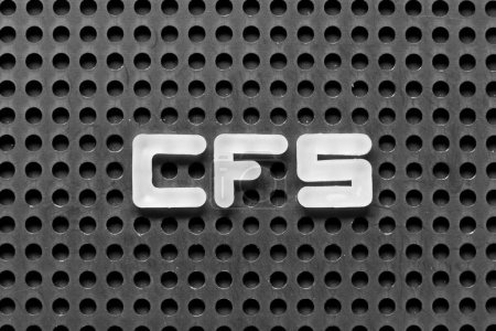 Photo for White alphabet letter in word CFS (Abbreviation of Container Freight Station, Certified fund specialist or Chronic fatigue syndrome) on black pegboard background - Royalty Free Image