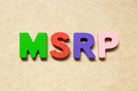 Téléchargez les photos : Color alphabet letter in word MSRP (Abbreviation of manufacturer's suggested retail price) on wood background - en image libre de droit
